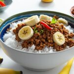 Arroz com picadinho e banana (Imagem meramente Ilustrativa)